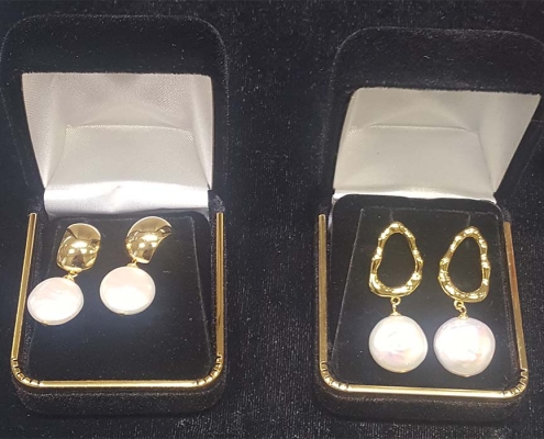 fresh water pearl earrings set in gold plated sterling silver