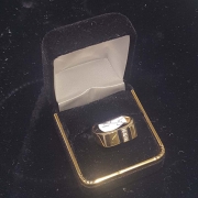 mans custom gold ring with onyx and diamonds