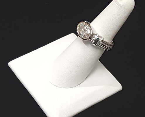 ladies custom diamond ring with a 2.80ct oval diamond and .20cts of accent diamonds