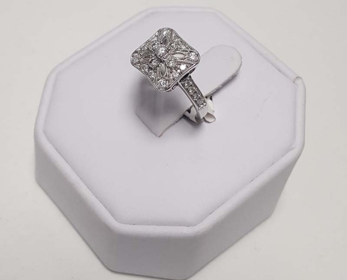 27 diamonds totaling .50ct set in 14kt white gold
