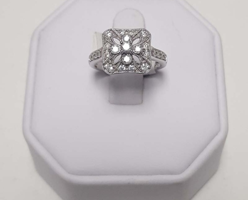 27 diamonds totaling .50ct set in 14kt white gold