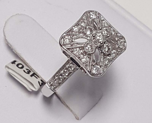 27 diamonds totaling .50ct set in 14kt white gold