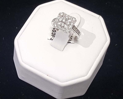 27 diamonds totaling .50ct set in 14kt white gold