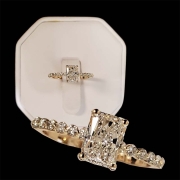 custom 1.01ct radiant cut diamond .24cts in diamonds down the sides - set in 14k yellow gold