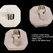 lady's custom 3 diamond ring with 90pts set in 14k white gold