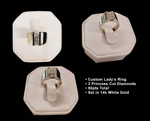 lady's custom 3 diamond ring with 90pts set in 14k white gold