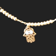 10kt yellow gold beaded necklace with hamsa pendant