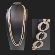 40" double strand freshwater pearl necklace with 3 reversible solid silver hoop connectors fully enhanced with top of the line cubics on one side and flat shiny silver with only a few crystals on the other