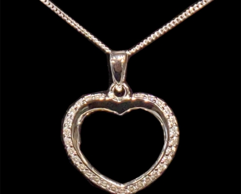 cubic zirconia stones set in silver heart & chain